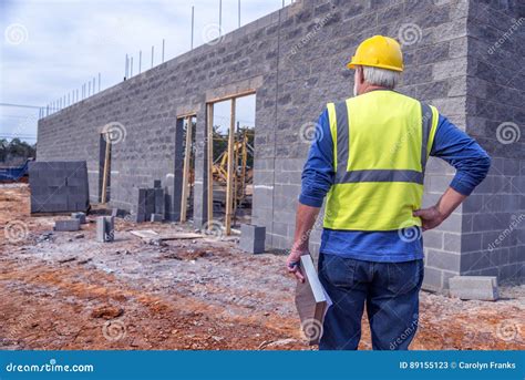 Construction Supervisor Looks Over Job Site Stock Image Image Of