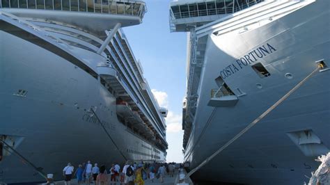 People Walking Between Two White Cruise Ships On Port Hd Cruise Ship