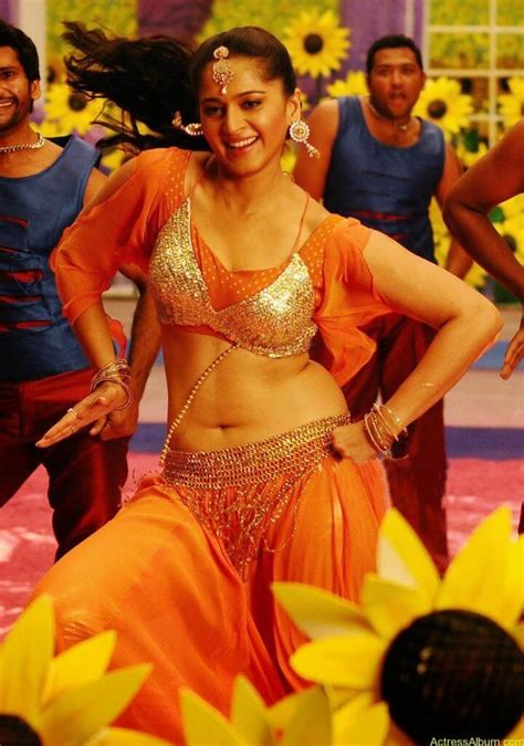 Anushka Shetty Hot In Gold Sexy Navel Show In Dance Scene Stills