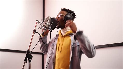 Man Singing in the Music Studio · Free Stock Video