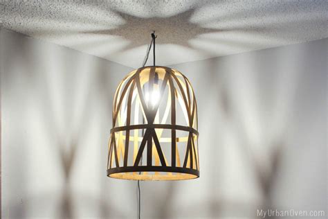 Your lamp should now look like this. DIY Wooden Basket Hanging Lamp | My Urban Oven
