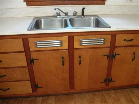 All cabinets are assembled and ready to install, allowing you the hardware and finish of your choice. Stash of NOS kitchen sink cabinet vents made by Washington ...