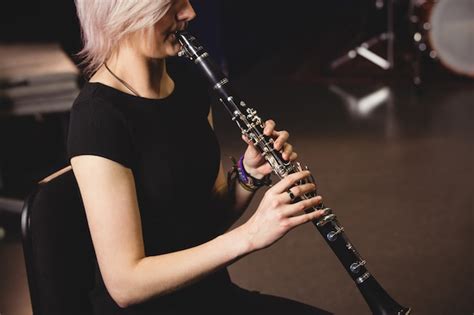 Free Photo Female Student Playing Clarinet