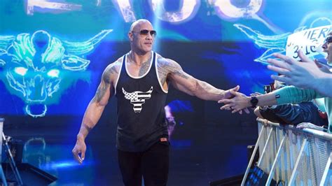 the rock makes surprise return to wwe hints at major wrestlemania showdown