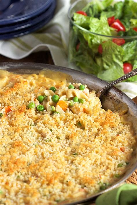 Egg noodles are combined with canned tuna in a creamy sauce and then baked. The Very Best Tuna Noodle Casserole - The Suburban Soapbox