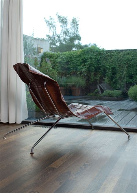 Foldable barcelona chair, modern design with genuine leather. VK001 chair by Sander Mulder. An industrially produced ...