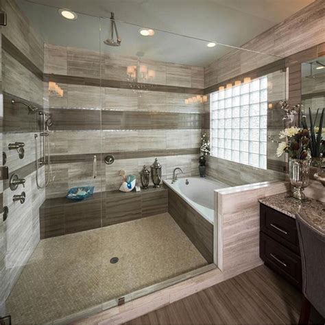 A Bathroom With Marble Counter Tops And Wooden Flooring Along With A