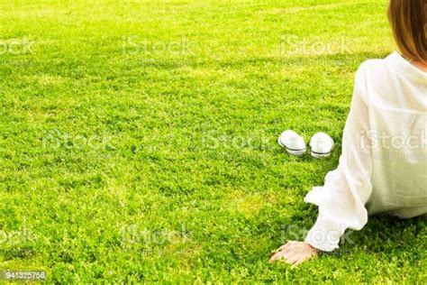 Female Bare Feet On Mawed Lawn Grass Young Woman Resting Outdoors