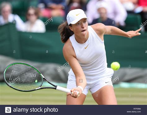 Get the latest news, stats, videos, and more about tennis player iga swiatek. Polish player Iga Swiatek in action at Wimbledon,London ...