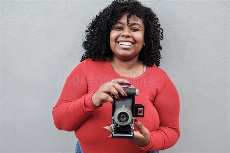 Curvy African Woman Using Vintage Camera Outdoor Focus On Face Stock Image Image Of Focus