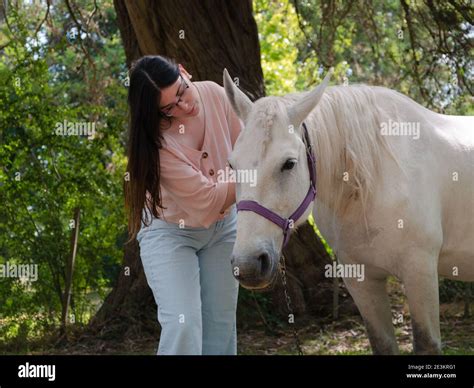 Woman About To Mount Horse Hi Res Stock Photography And Images Alamy