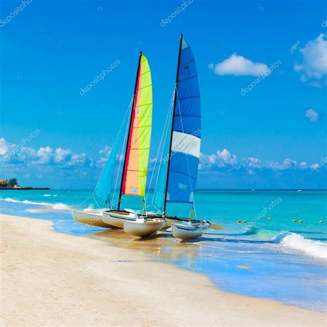 Sailing Boats On A Tropical Beach In Cuba — Stock Photo © Kmiragaya