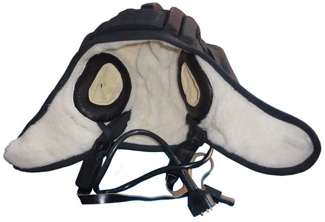 Although it is referred to as a helmet, it more resembles a very cushioned hat. Russian tanker helmet. Winter. Sheepskin fur.