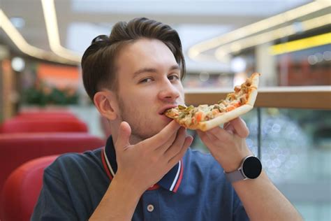 Premium Photo Portrait Of Young Happy Handsome Man Hungry Guy Is