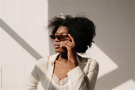 Trendy Black Female In Sunglasses By Stocksy Contributor Sergey