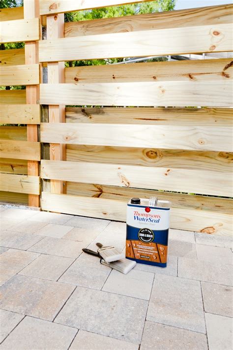 Horizontal slat style railing with or without wood top rail. Stunning DIY Horizontal Slat Fence | Lifestyle | Fresh ...