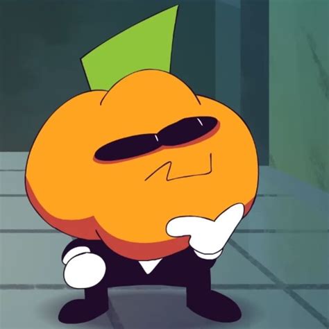 An Orange With Sunglasses And A Green Leaf On Its Head