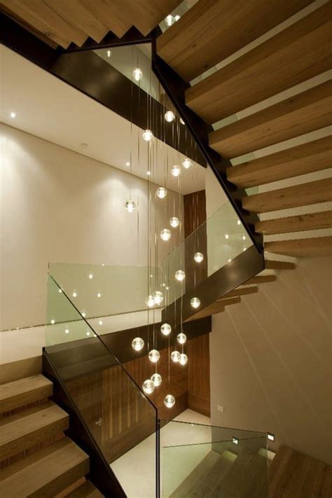 A Custom Chandelier For The 14 Series Down Through A Stairwell