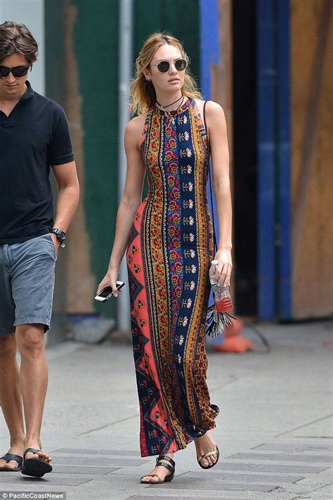 Candice Swanepoel Showcases Her Supermodel Figure In A Bold Patterned Maxi Dress As She Enjoys