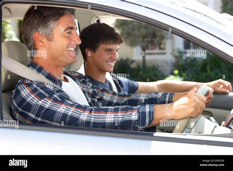 Father On Car Journey With Teenage Son Stock Photo Alamy