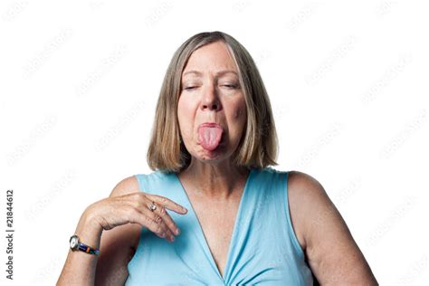 Older Woman Sticking Out Her Tongue Stock Photo Adobe Stock