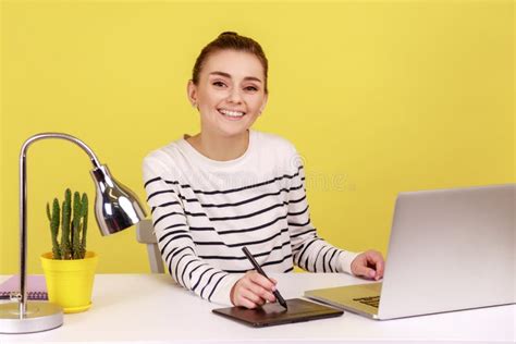 Woman Creative Designer Sitting At Workplace With Graphic Tablet And