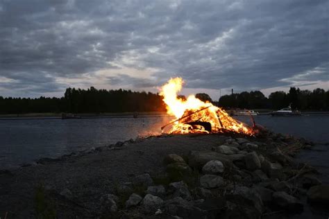 Traditional Bonfire On The Summer Solstice On The Shore Of The L