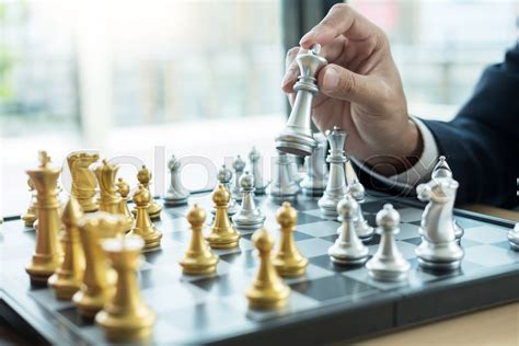 Businessman Playing Chess Figure Take Stock Image Colourbox