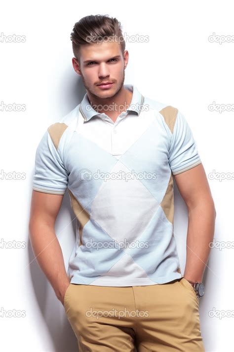 Casual Man With Both Hands In Pockets Stock Photo By ©feedough 31404907