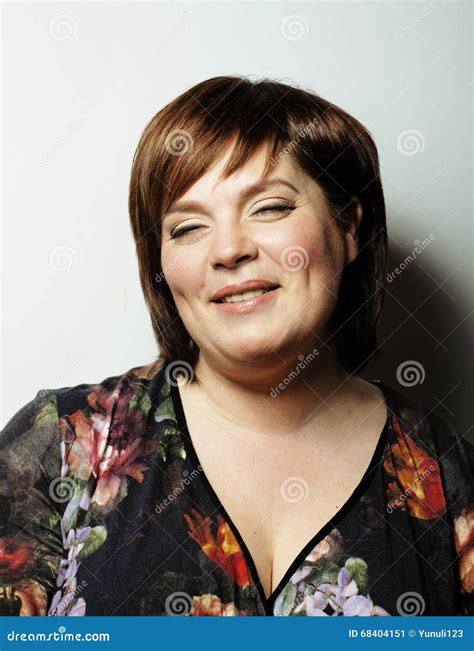 Mature Fat Cheerful Smiling Woman Close Up In Studio Stock Image