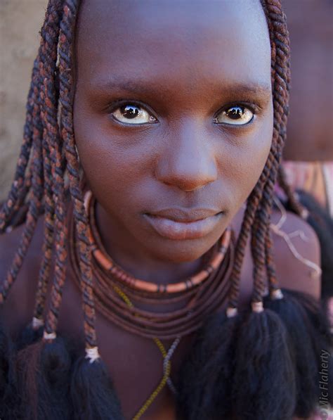 Himbas Gaze A Young Himba Woman In Northern Namibia Is Mo Flickr