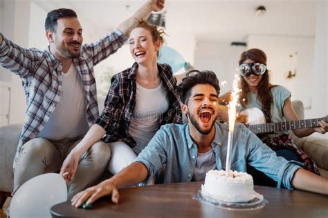 Cheerful Young Friends Having Fun On Party Stock Photo Image Of