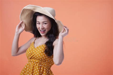 Cheerful Woman Dressed In Skirt And Wearing A Hat Advertising Concept