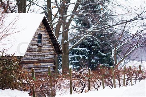 Winter Christmas Scene With A Log Cabin Stock Image