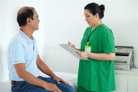 Nurse Talking To Patient Stock Photo Image Of Practitioner 244328494