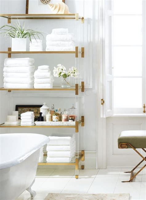 It marries the perfect balance of white with gold accents and turns a dull kitchen into a modern wonder. Beautiful all-white bathroom with bright brass and ...