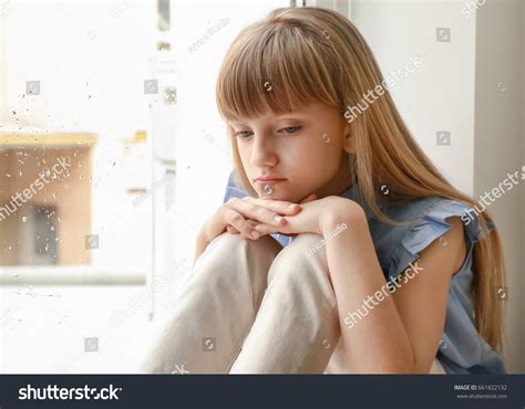 Sad Little Girl Sitting Near Window Stock Photo 661822132 Shutterstock