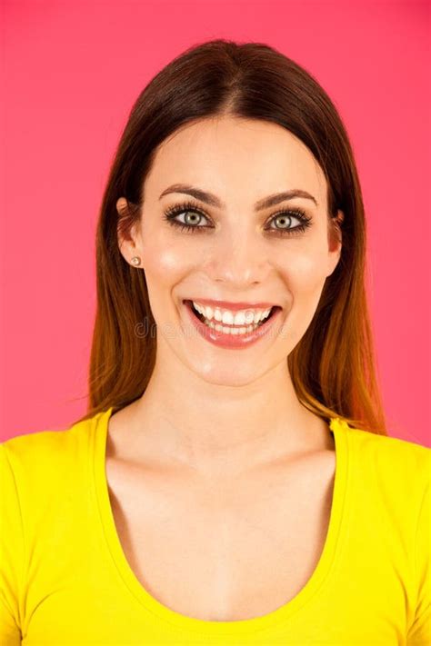 Funky Young Woman In Yellow T Shirt Pose Over Pink Background Stock