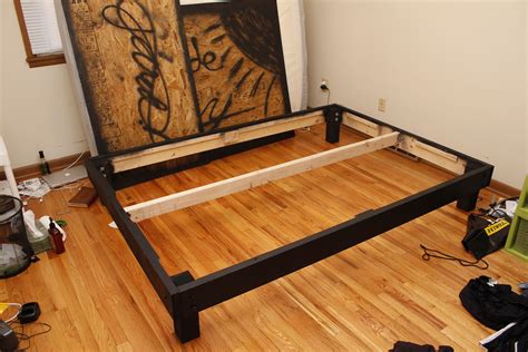 Build the back of the unit out of 3/4″ plywood and drill pilot holes before securing it to the frame of the storage unit. Build a queen size platform bed on the cheap And learn ...