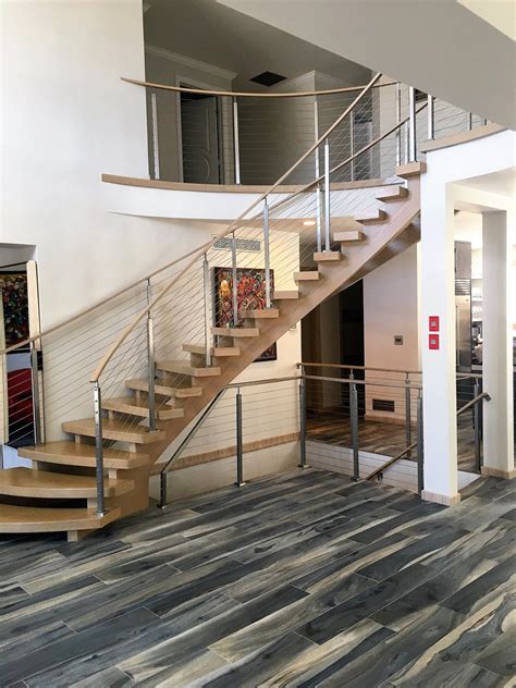 Floating Curved Wood Staircase And Cable Railing Cable Railing