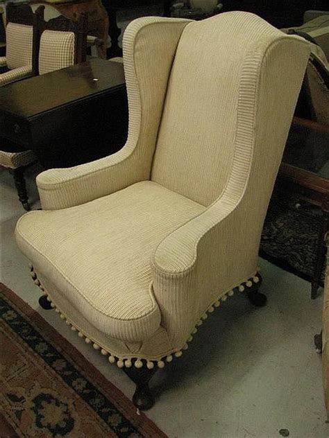 A vintage wing chair with cream upholstery - Seating - Singles/Pairs