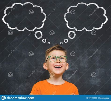 Child Thinking With A Thought Bubble On The Blackboard Concept For