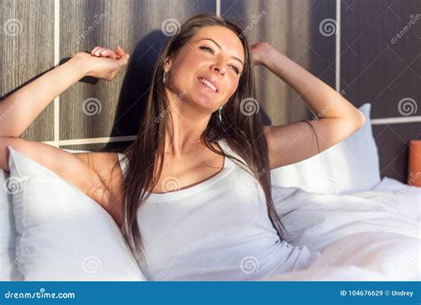 Morning Young Woman Waking Up Stretching Her Arms Lying In Bed Stock Image Image Of Pillow
