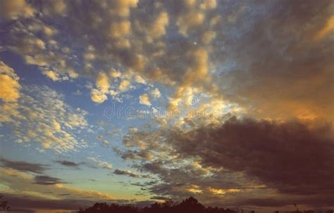 Cumulus Sunset Clouds With Sun Setting Down Dramatic Sunset Sky Toned