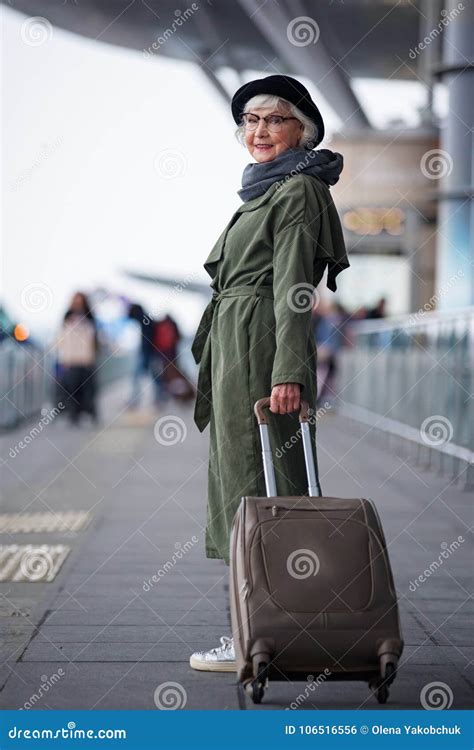 Pleasant Old Lady Is Carrying Luggage Stock Photo Image Of Joyful