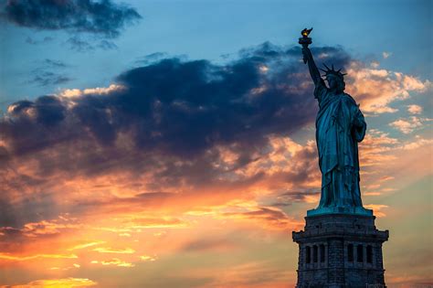 Download Sunrise Sunset Sky Cloud Man Made Statue Of Liberty Hd Wallpaper