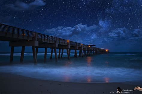 Milky Way Over Juno Beach Pier Under Moonight By Justin Kelefas On