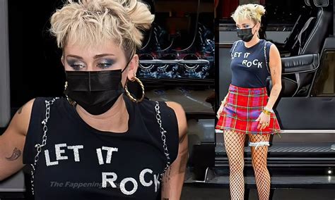 Miley Cyrus Grabs Attention In A Mini Skirt And Fishnets In Nyc 22
