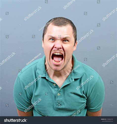 Portrait Angry Man Screaming Against Gray Stock Photo 414806194