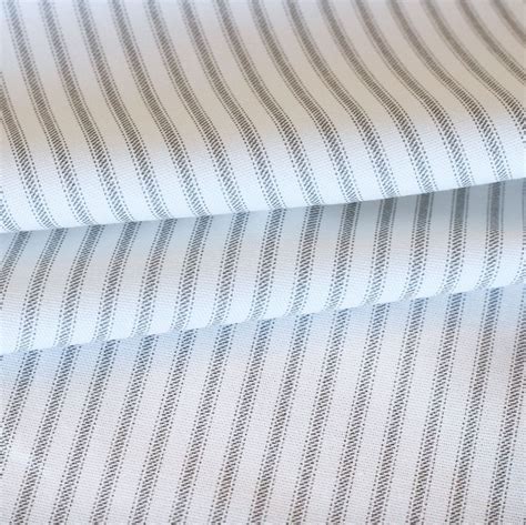 A Classic Grey And White Striped Fabric Suitable For Upholstery